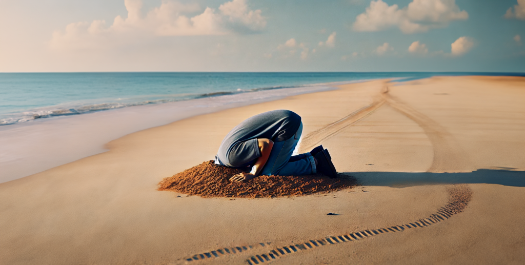 Man steckt den Kopf in den Sand