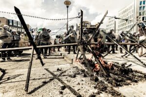 Streets with police and burning barricades