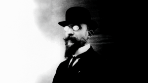 Satie's final persona, bowler-hatted and formally dressed