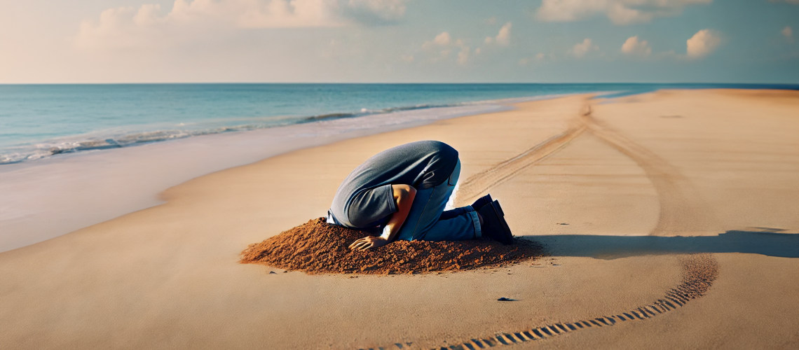 Man steckt den Kopf in den Sand