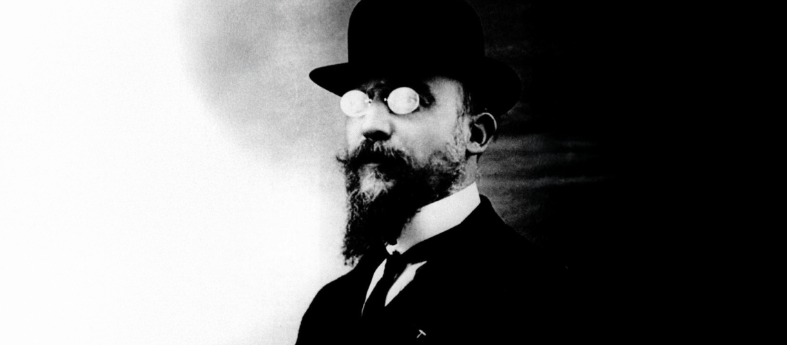 Satie's final persona, bowler-hatted and formally dressed